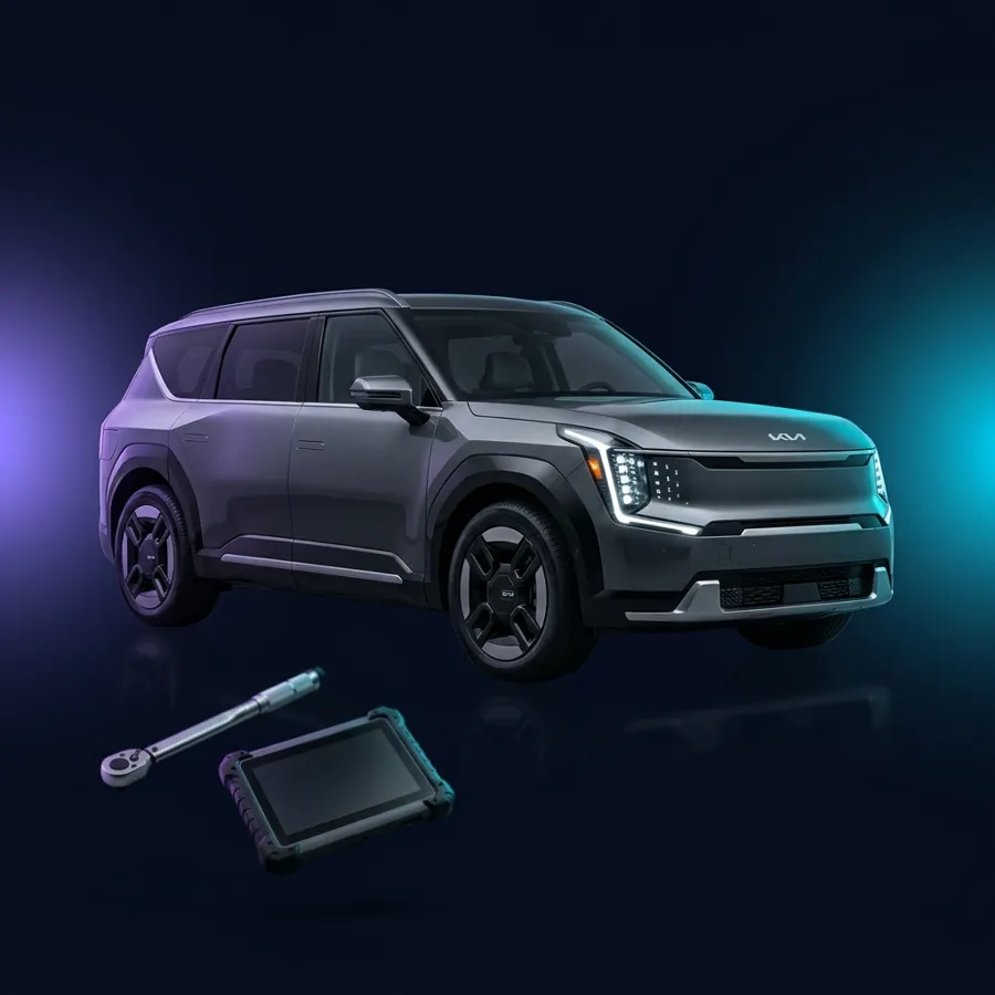 Kia EV9 naast een momentsleutel en diagnosetablet